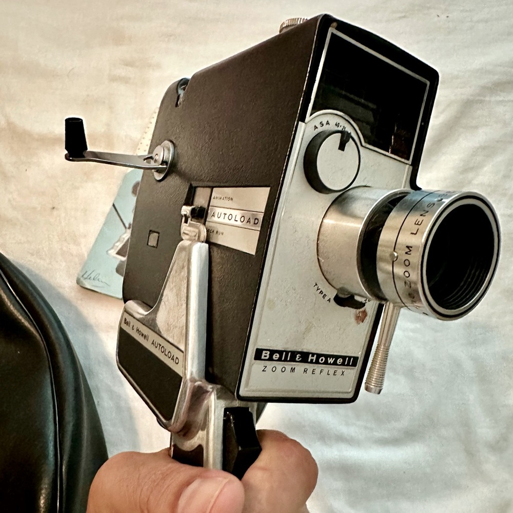 Vintage Bell & Howell Autoload Cartridge Movie Camera w Original Brochure.